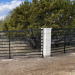 Custom matte black steel flat bar fence with columns (1)