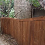 Vertical cedar fence with Cap and Trim