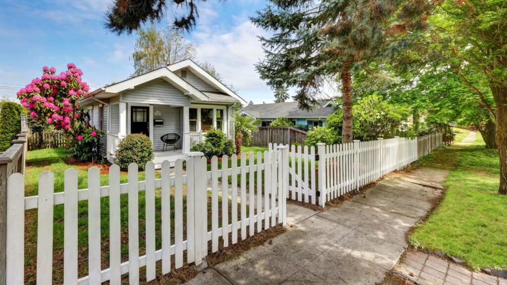 img of a house with a fence