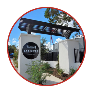 A sign on a white wall.