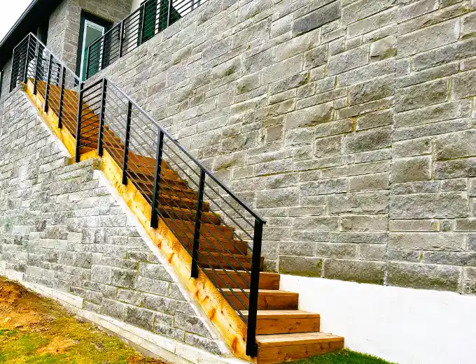 Cedar deck custom iron with a masonry exterior